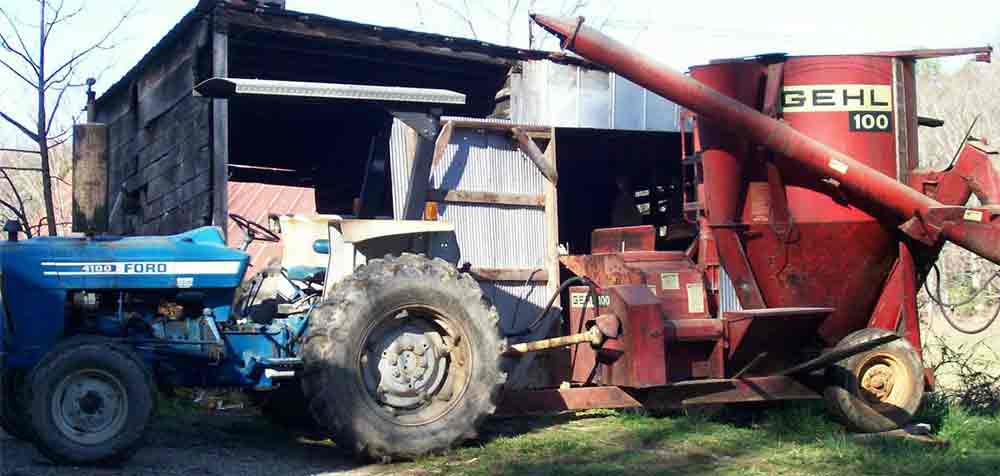 Tony's Ford tractor and a Gehl 100 grinder