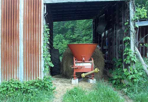 Seed and fertilizer spreader